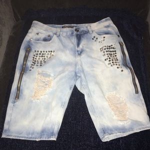 Men’s distressed jean shorts, w/ stud accents.